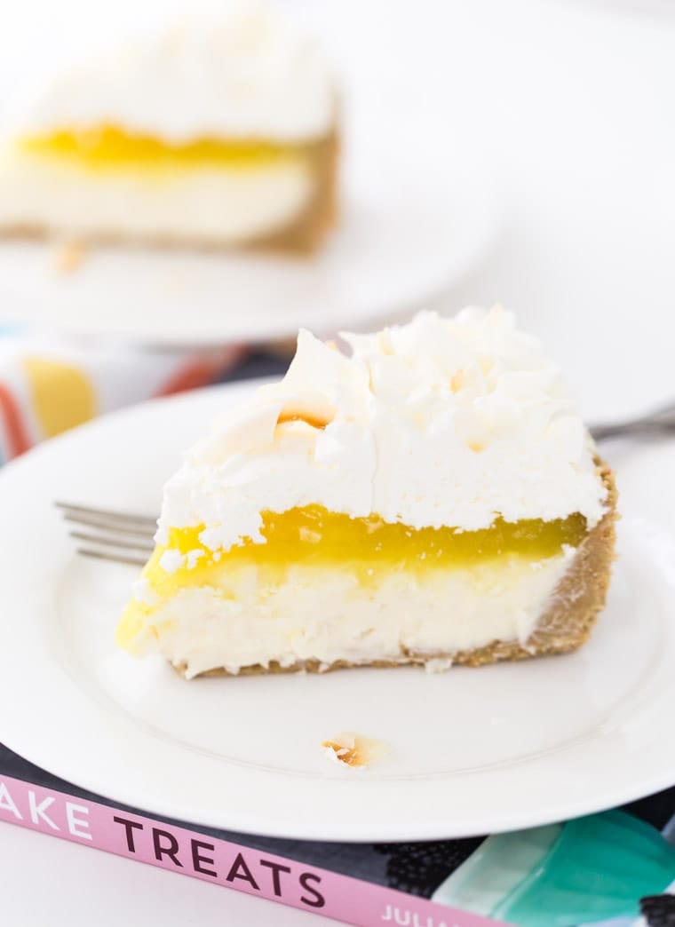 This lemon macaroon cheesecake is a rich and decadent no-bake treat with golden oreo crust, white chocolate cheesecake filling and lemon curd topping. 