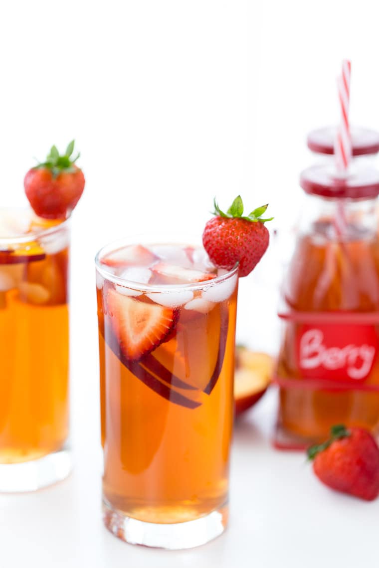 This homemade Strawberry Peach Iced Tea recipe is refreshing, sweet and bursting with fresh peaches and strawberry flavor