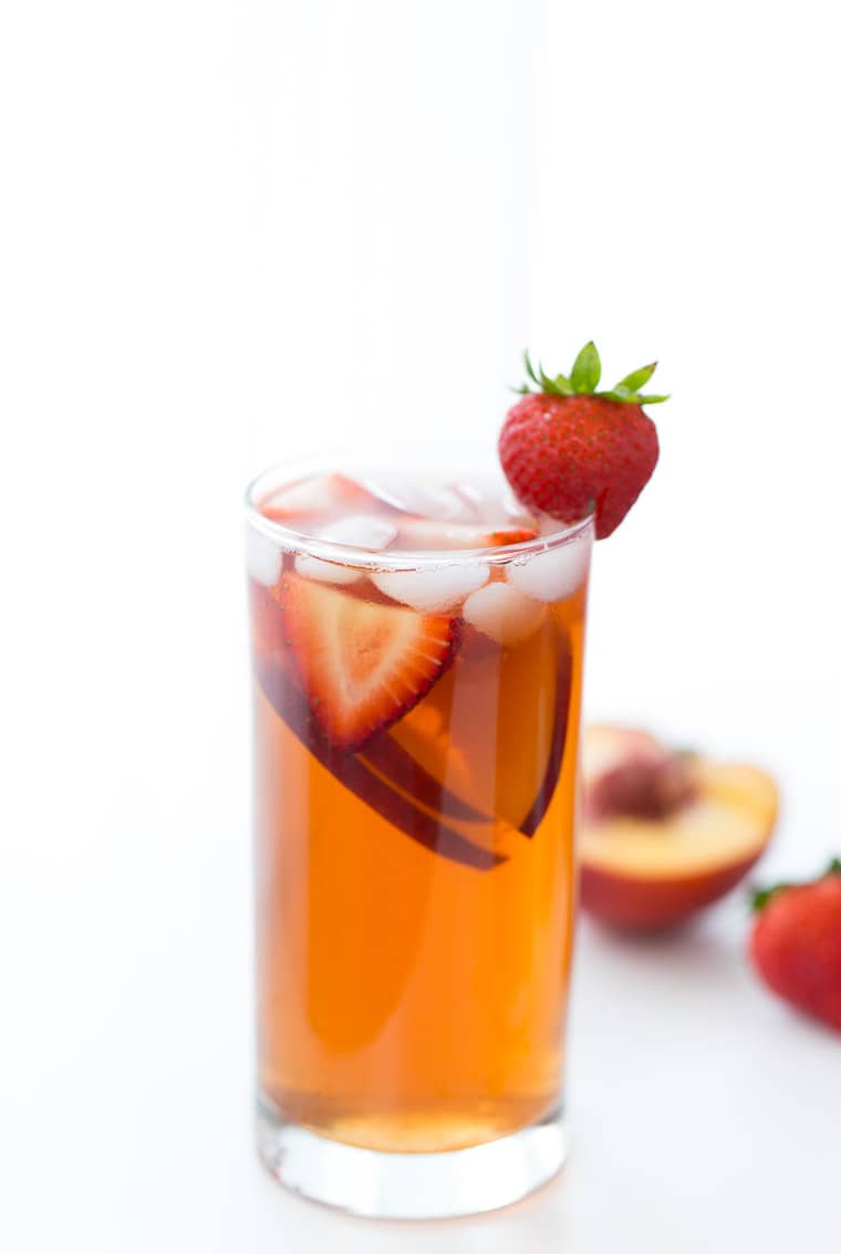 This homemade Strawberry Peach Iced Tea recipe is refreshing, sweet and bursting with fresh peaches and strawberry flavor. 