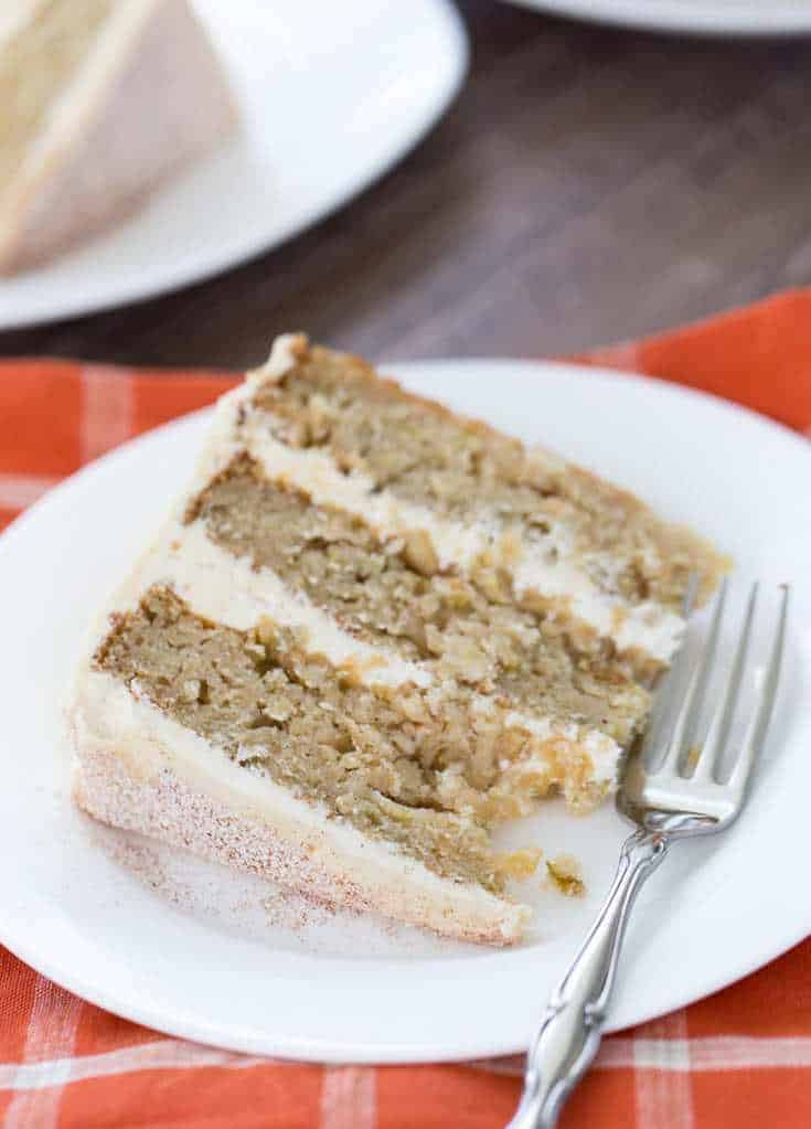 A soft, moist and crumbly apple cider cake with a whipped vanilla malt frosting makes this cake a great fall recipe.