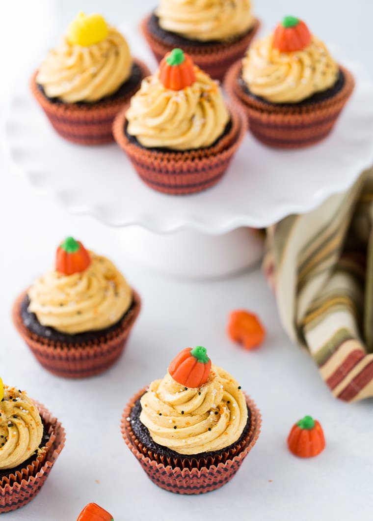 These chocolate pumpkin cupcakes are rich, decadent chocolate cupcakes with an irresistible pumpkin pie frosting.