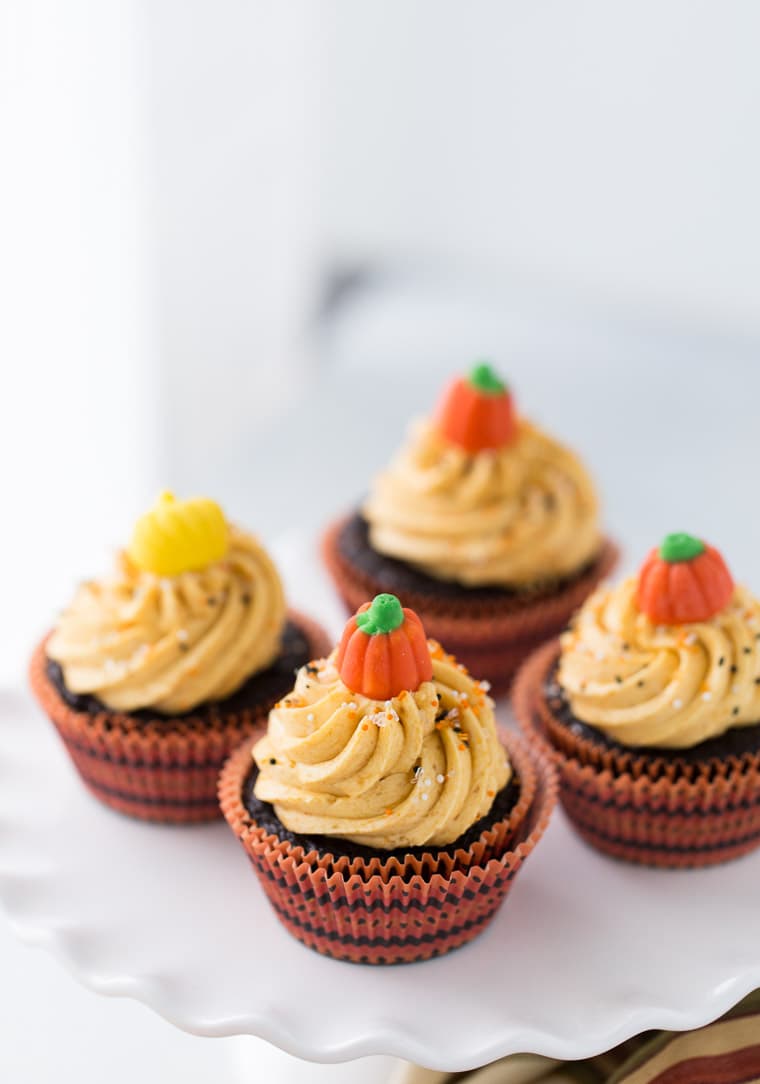 These chocolate pumpkin cupcakes are rich, decadent chocolate cupcakes with an irresistible pumpkin pie frosting.