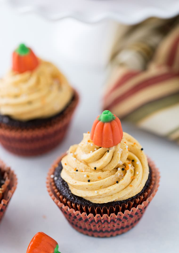 These chocolate pumpkin cupcakes are rich, decadent chocolate cupcakes with an irresistible pumpkin pie frosting.