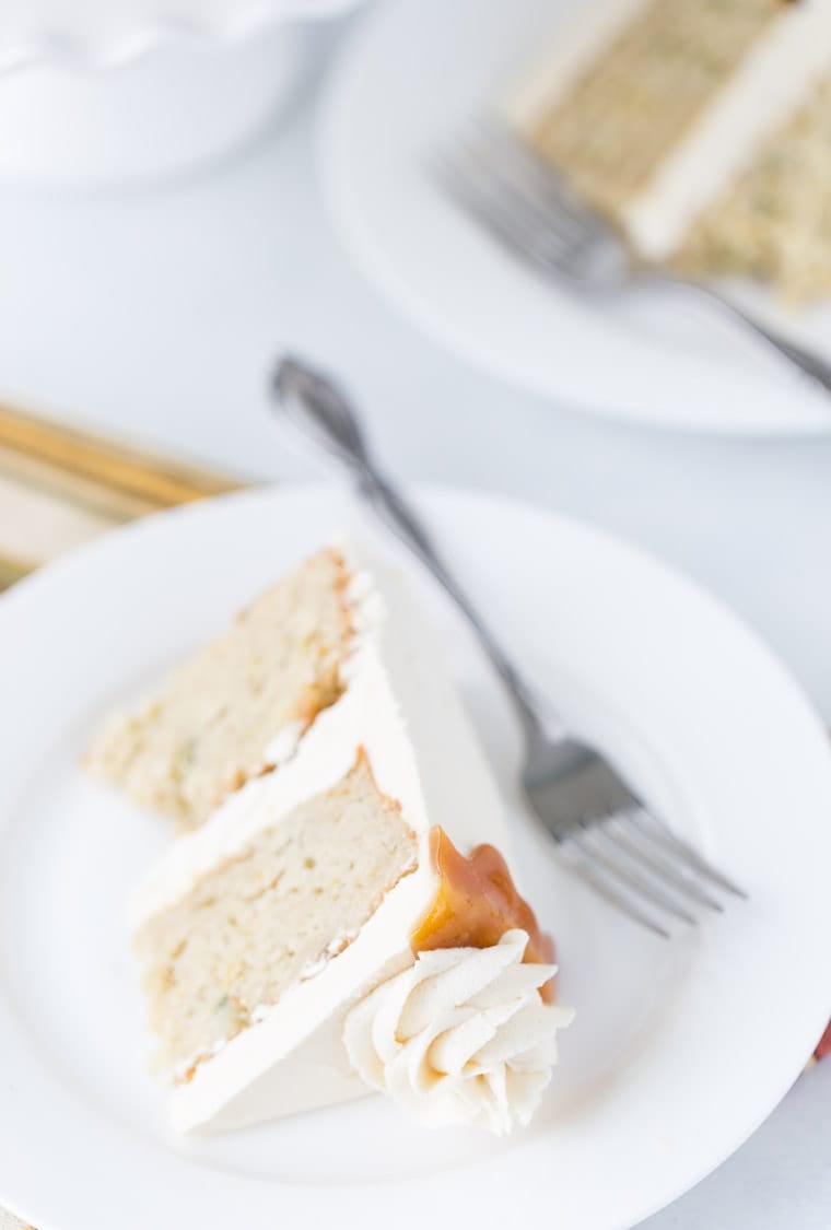 This Spiced Pear Cake is moist from fresh juicy pears, nutty from browned butter and topped with a honey caramel frosting. 