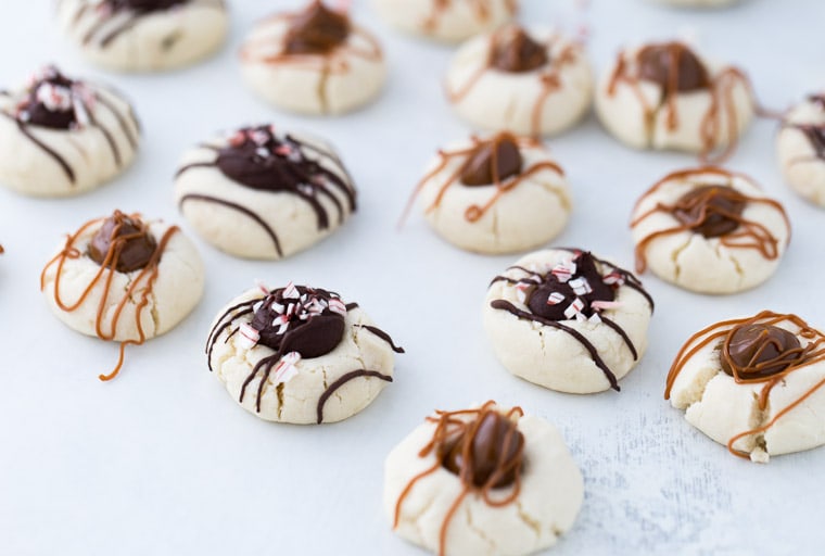 These melt in your mouth Shortbread Thumbprint Cookies are the perfect holiday exchange cookie recipe.