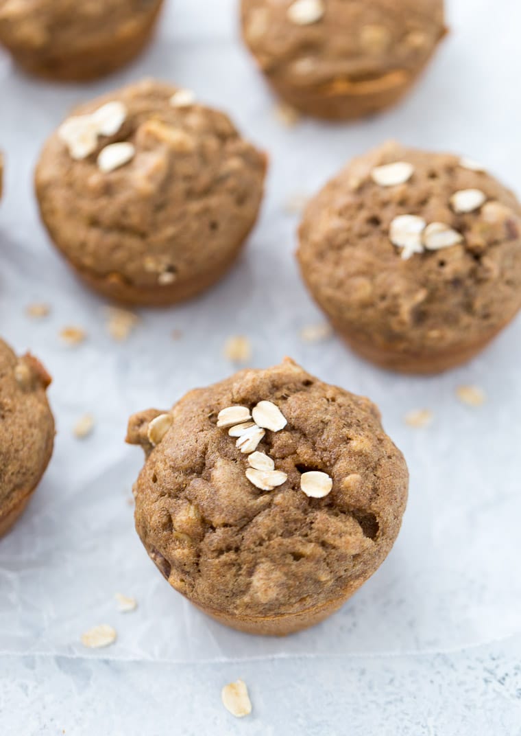 banana nut muffins on a white background.