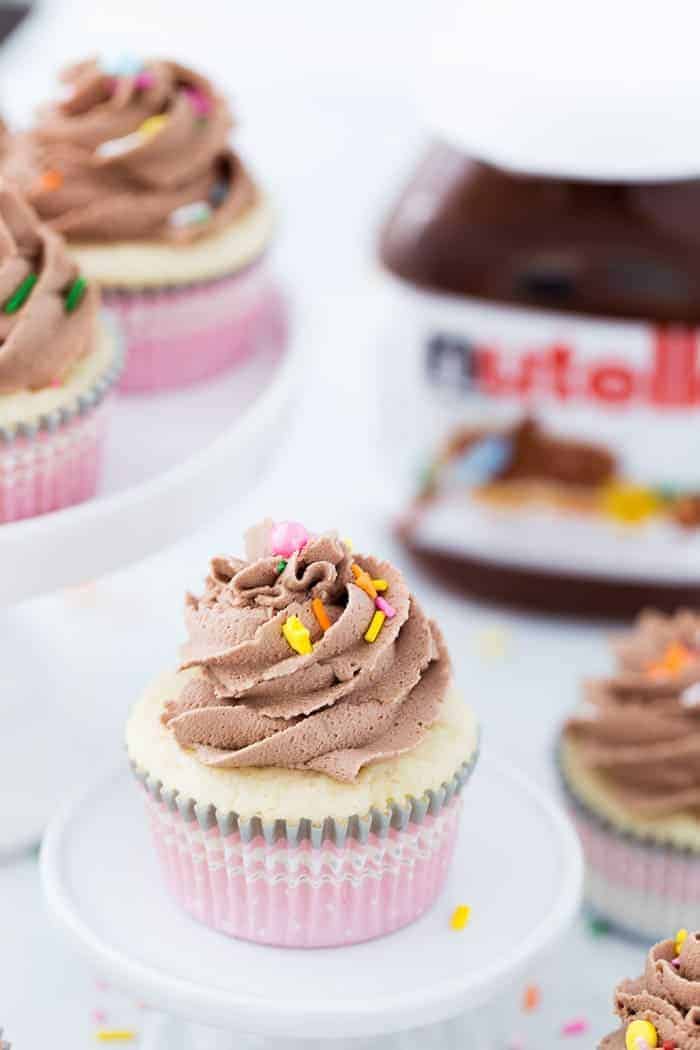 These vanilla cupcakes with nutella frosting are moist, nutty and topped with a whipped nutella buttercream that is creamy delicious. 