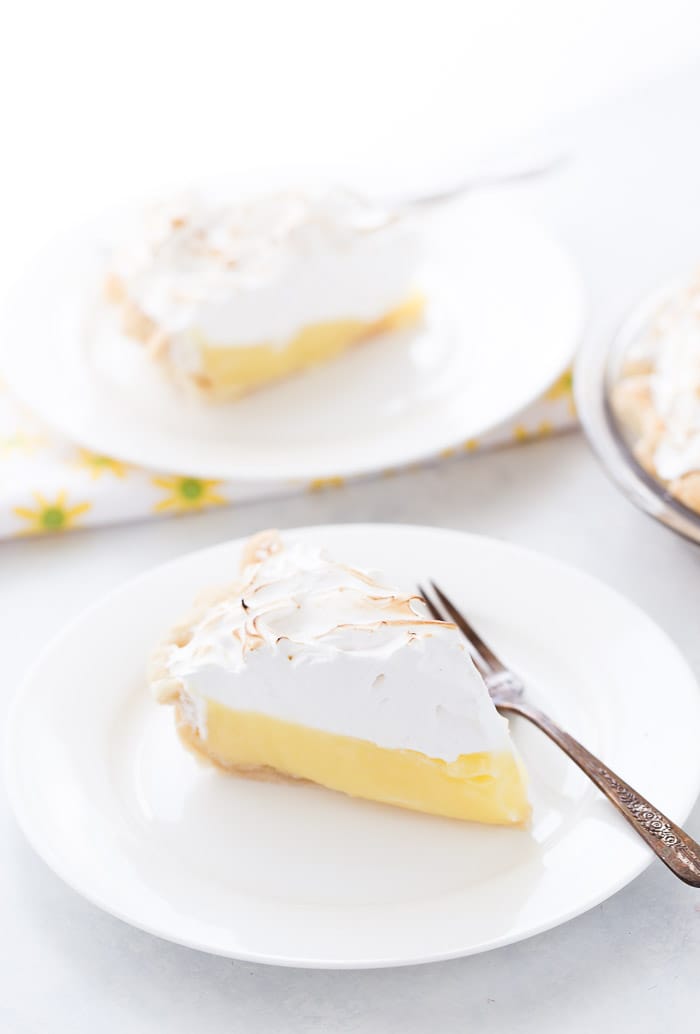 This classic lemon meringue pie is beyond amazing with a flaky pie crust filled with tart lemon custard filling and topped with a toasty meringue cloud.