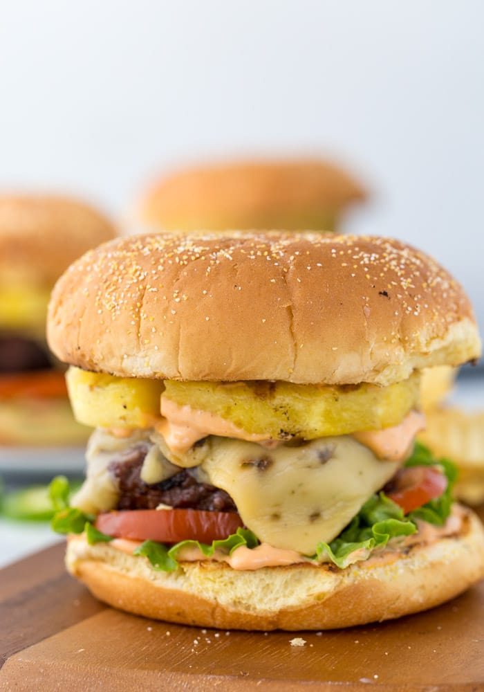 These pineapple jalapeno burgers are topped with pepper jack cheese, chipotle mayo, grilled pineapples and jalapenos. Each bite is packed with flavors and you will be reaching for more this summer.