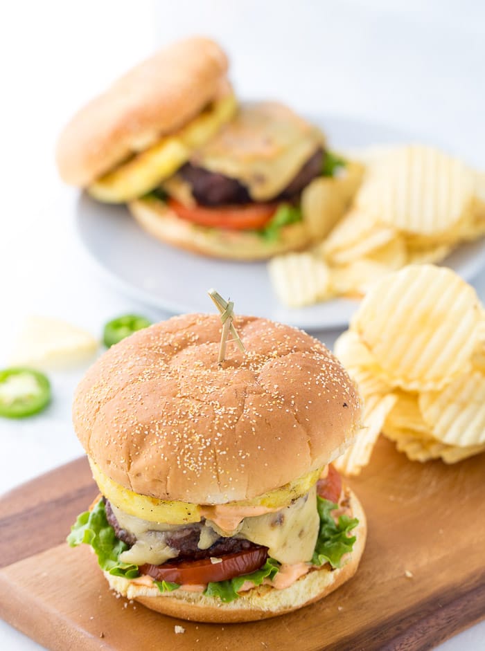 These pineapple jalapeno burgers are topped with pepper jack cheese, chipotle mayo, grilled pineapples and jalapenos. Each bite is packed with flavors and you will be reaching for more this summer.