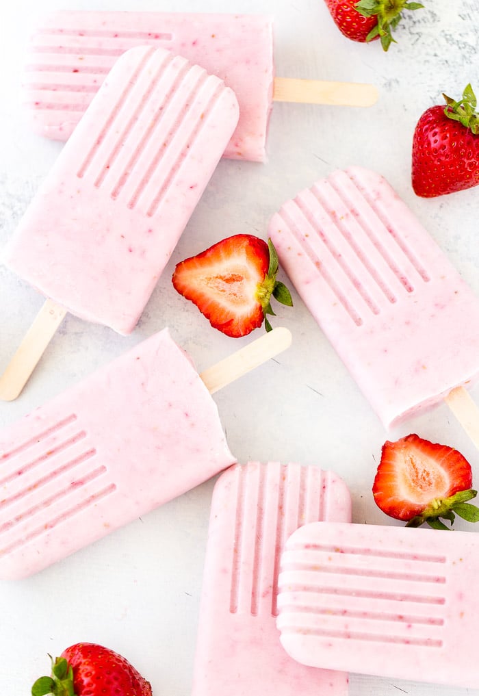  These strawberry coconut cheesecake popsicles are creamy, delicious and refreshing. 