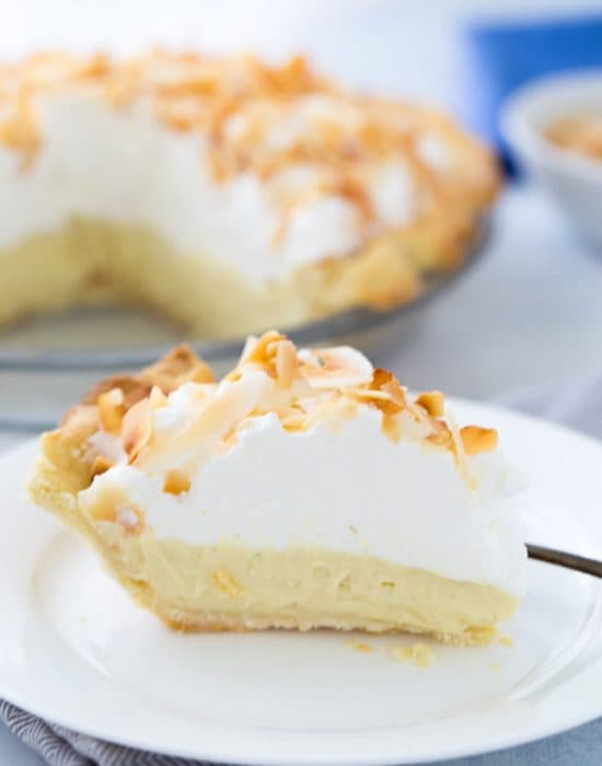 This is your classic coconut cream pie recipe with a sweet silky custard filling rich in coconut flavor. It's the perfect summer pie!