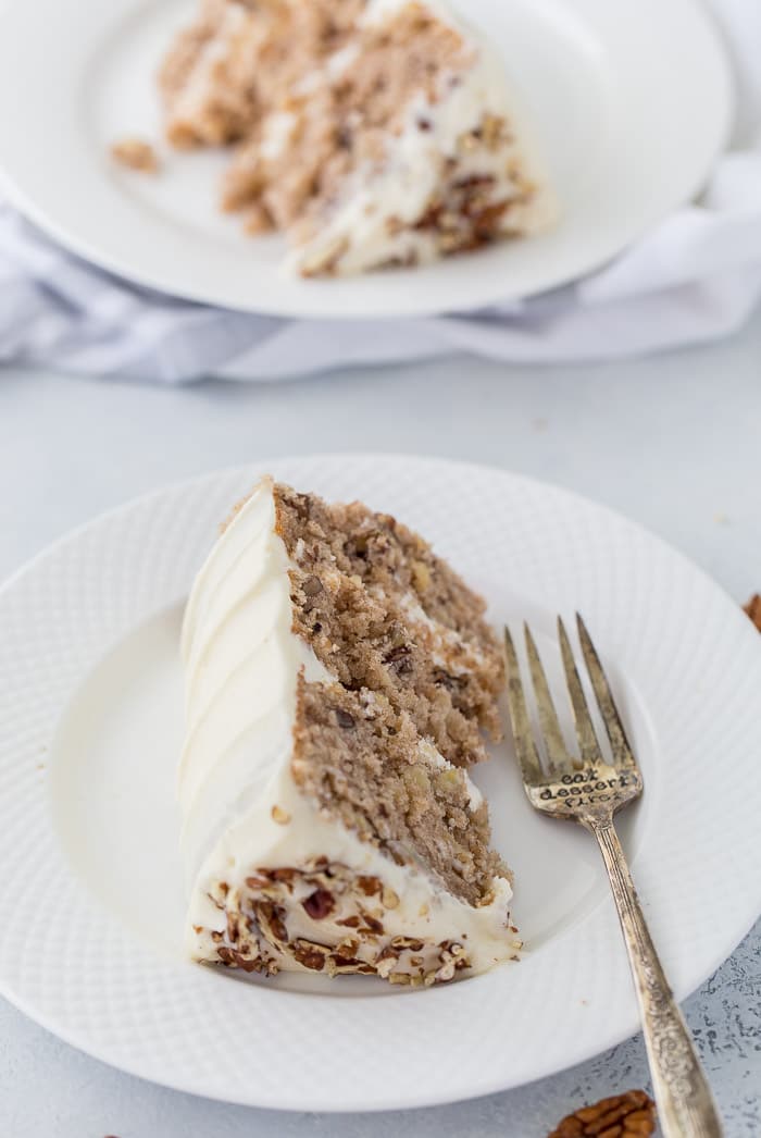 A classic hummingbird cake with a pineapple, banana and pecan spiced cake topped with cream cheese frosting. 