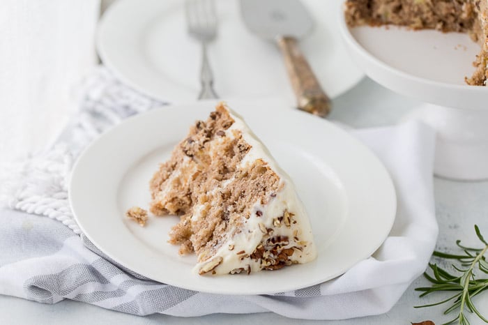 A classic hummingbird cake with a pineapple, banana and pecan spiced cake topped with cream cheese frosting. 