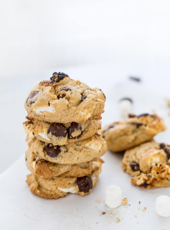 These S'mores Chocolate Chip Cookies are ooey-gooey perfection with a graham cracker cookie base filled with chocolate chips and mini marshmallows.