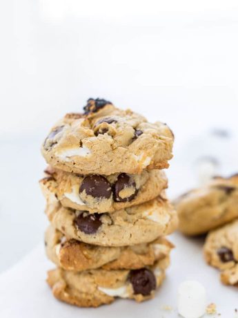 These S'mores Chocolate Chip Cookies are ooey-gooey perfection with a graham cracker cookie base filled with chocolate chips and mini marshmallows.