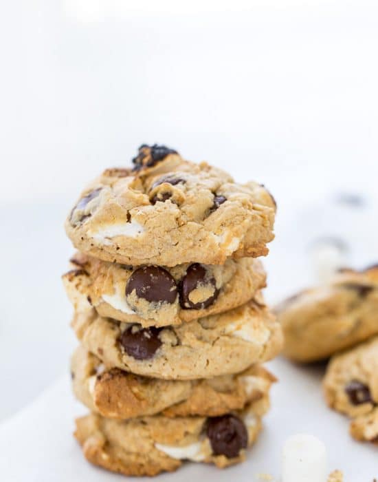 These S'mores Chocolate Chip Cookies are ooey-gooey perfection with a graham cracker cookie base filled with chocolate chips and mini marshmallows.