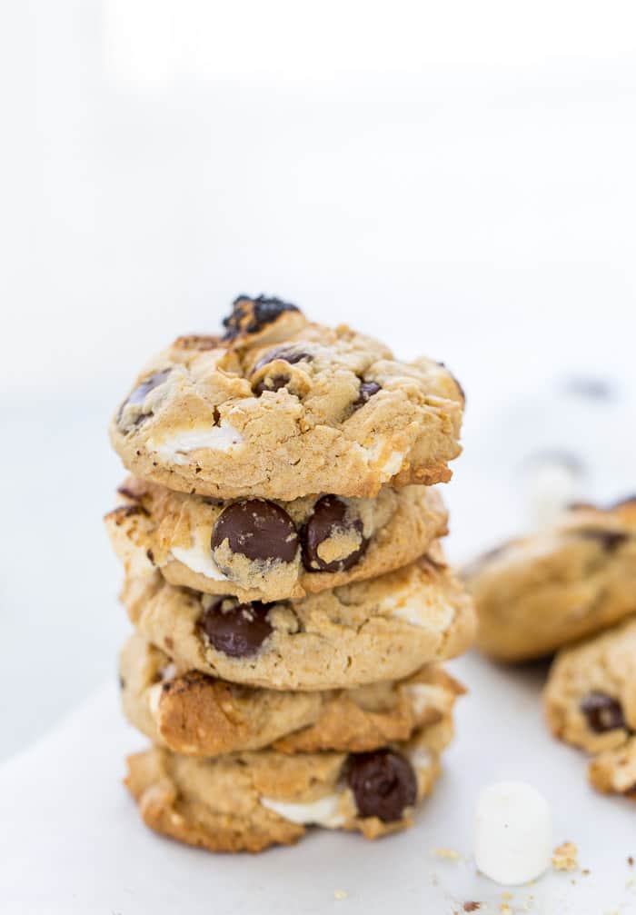 These S'mores Chocolate Chip Cookies are ooey-gooey perfection with a graham cracker cookie base filled with chocolate chips and mini marshmallows.