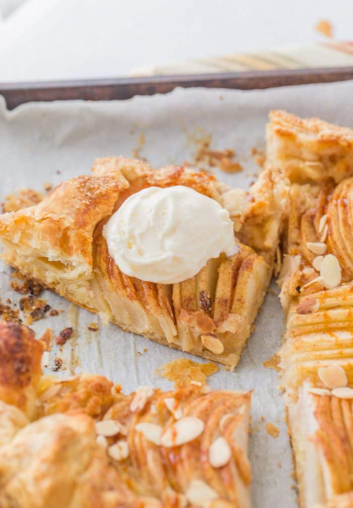 This pear almond galette is a fall-must have with juicy tender pears cooked on top of an almond frangipane inside a flaky puff pastry crust. 