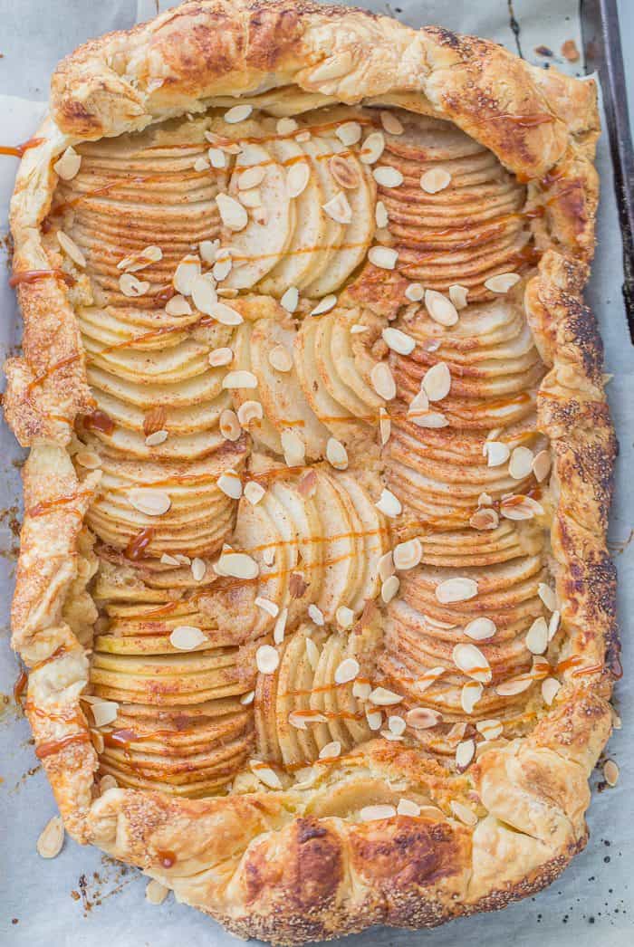 This pear almond galette is a fall-must have with juicy tender pears cooked on top of an almond frangipane inside a flaky puff pastry crust. 