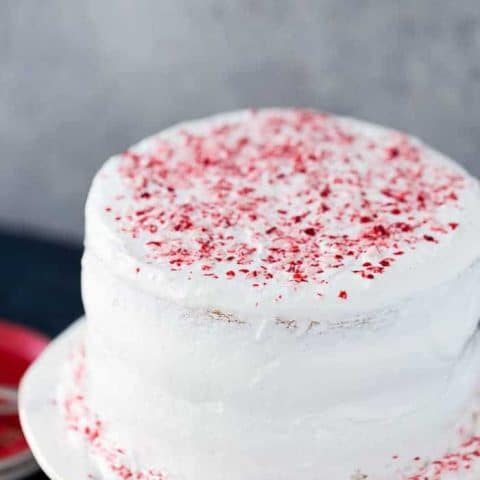 This peppermint layered cake is a holiday special with an airy, light peppermint crunch cake with a sweet peppermint cloud frosting. It's winter perfection.