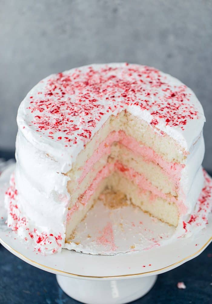 This peppermint layered cake is a holiday special with an airy, light peppermint crunch cake with a sweet peppermint cloud frosting. It's winter perfection.