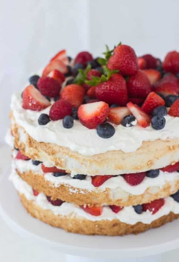 Angel Food Cake With Coconut Whipped Cream And Berries A Classic Twist