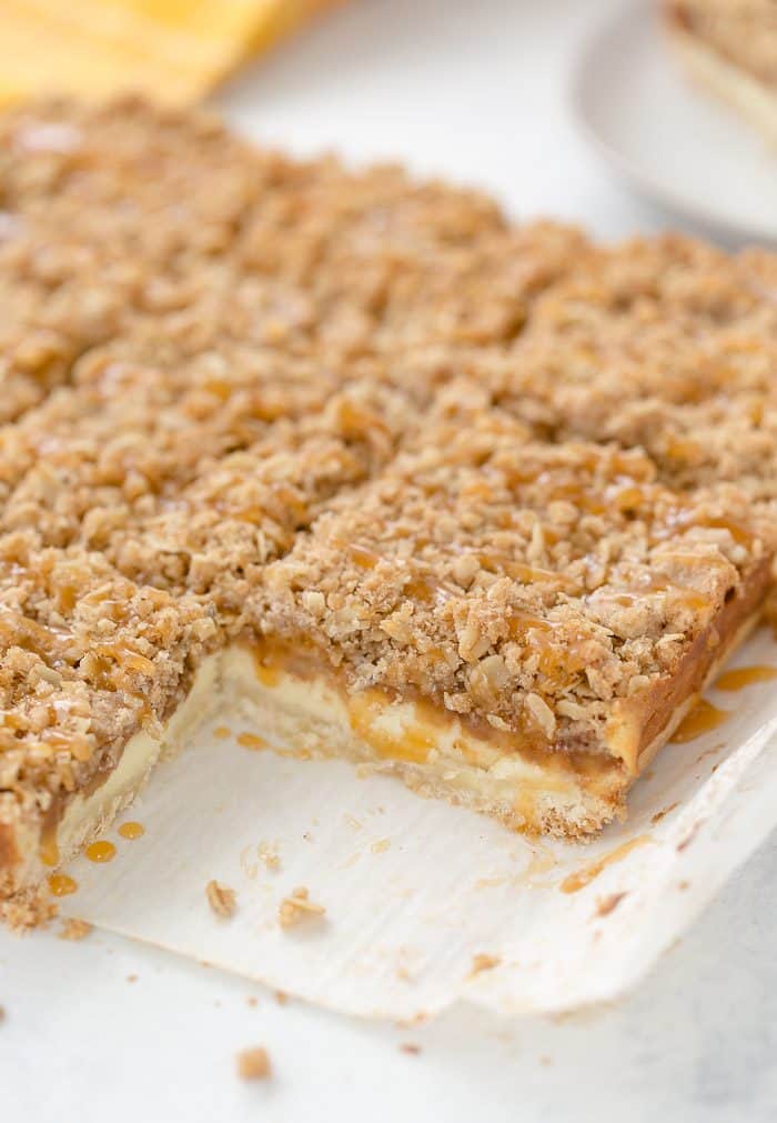 A triple layer of apples, cheesecake and crumb coat make these apple crumble cheesecake bars a different take on a classic fall dessert.