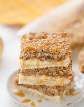 A triple layer of apples, cheesecake and crumb coat make these apple crumble cheesecake bars a different take on a classic fall dessert.