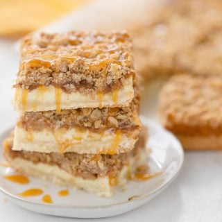 A triple layer of apples, cheesecake and crumb coat make these apple crumble cheesecake bars a different take on a classic fall dessert.