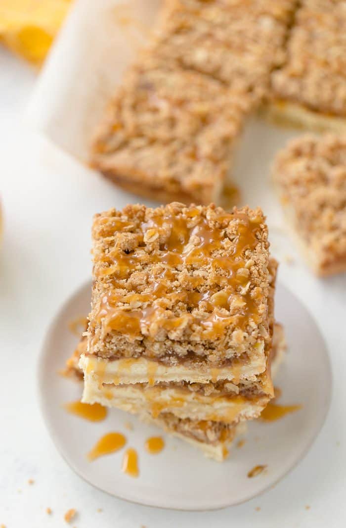 A triple layer of apples, cheesecake and crumb coat make these apple crumble cheesecake bars a different take on a classic fall dessert.