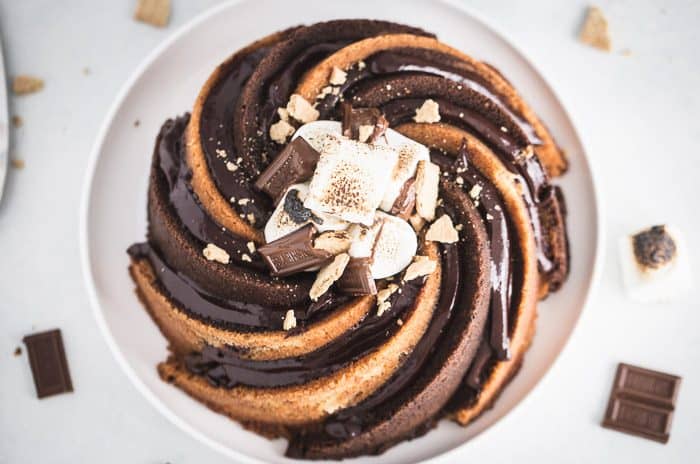 https://aclassictwist.com/wp-content/uploads/2019/08/Smores-Bundt-Cake-3-700x464.jpg