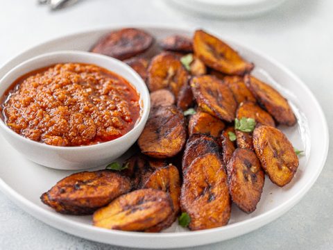 https://aclassictwist.com/wp-content/uploads/2021/02/Fried-Plantains-with-Hot-Pepper-Sauce-2-480x360.jpg