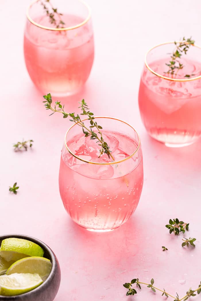 Cocktail with large ice cube and lemon twist Stock Photo