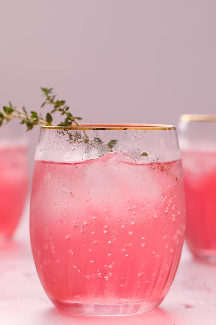 https://aclassictwist.com/wp-content/uploads/2022/02/Pink-Lemonade-Cocktail-2.jpg