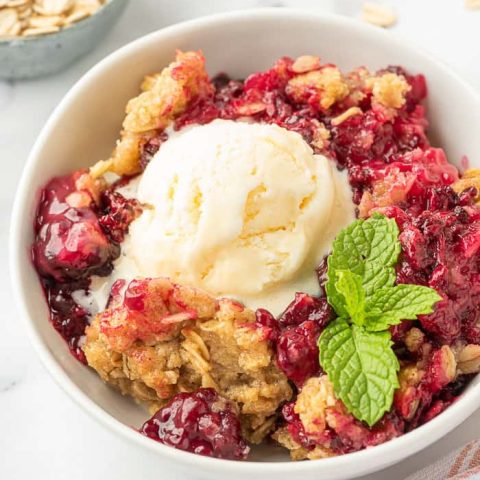 Blackberry crumble in a bowl.