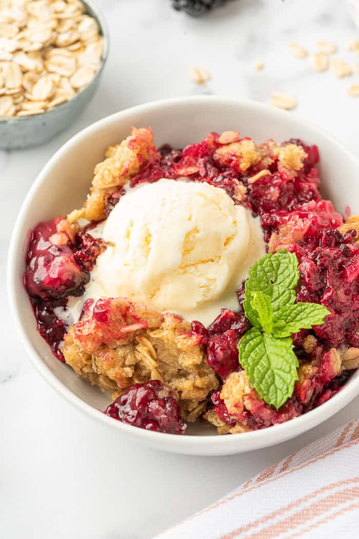 Blackberry crumble in a bowl.