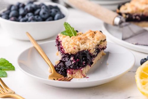 Blueberry crumb bars on a plate