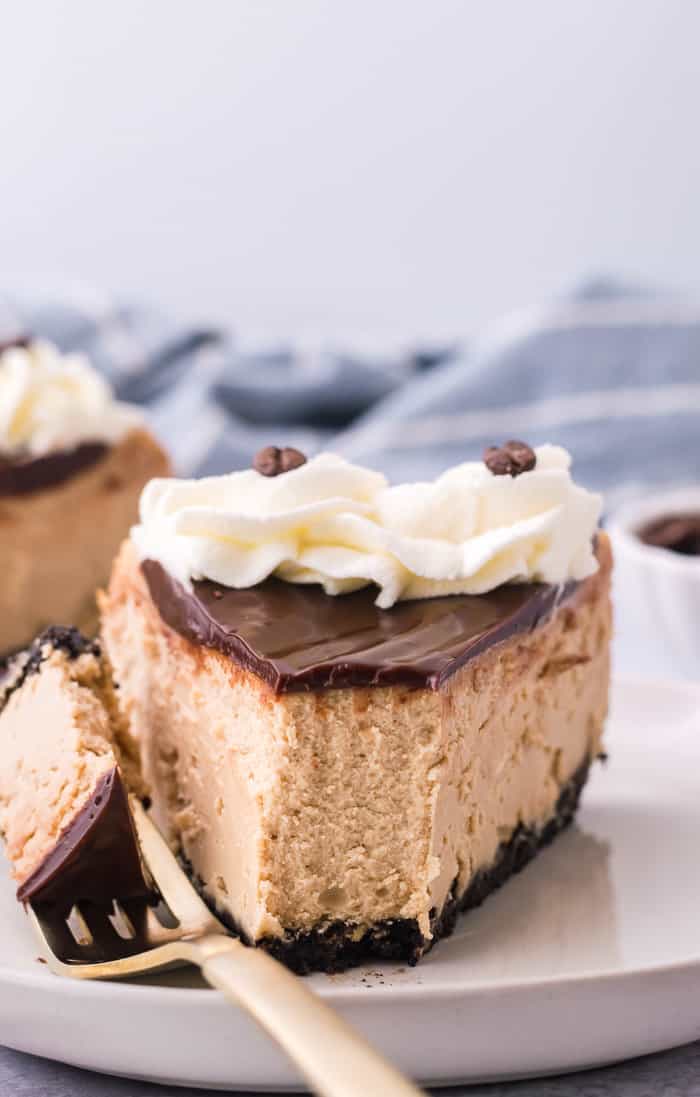 A slice of mocha cheesecake on a plate.