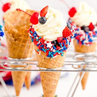 cheesecake stuffed waffle cones in a cone holder
