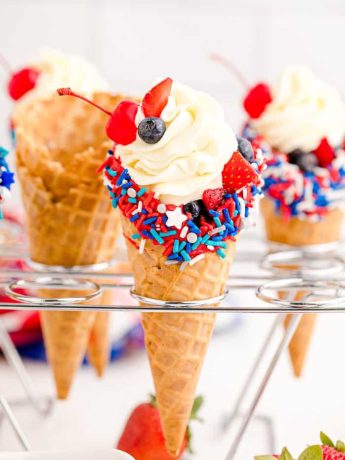 cheesecake stuffed waffle cones in a cone holder