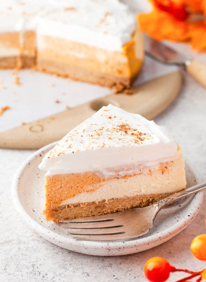 A slice of instant pot pumpkin cheesecake on a plate.