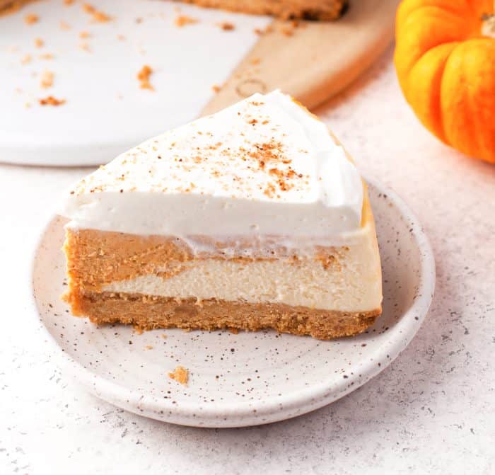 A slice of instant pot pumpkin cheesecake.