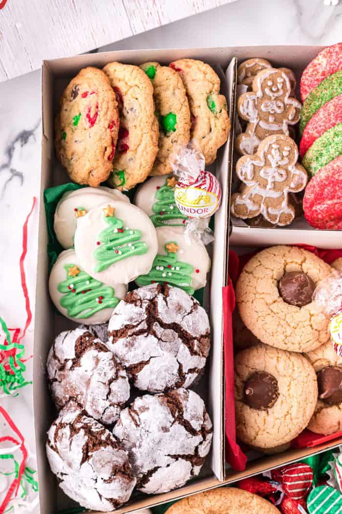Holiday cookie box filled with cookies.