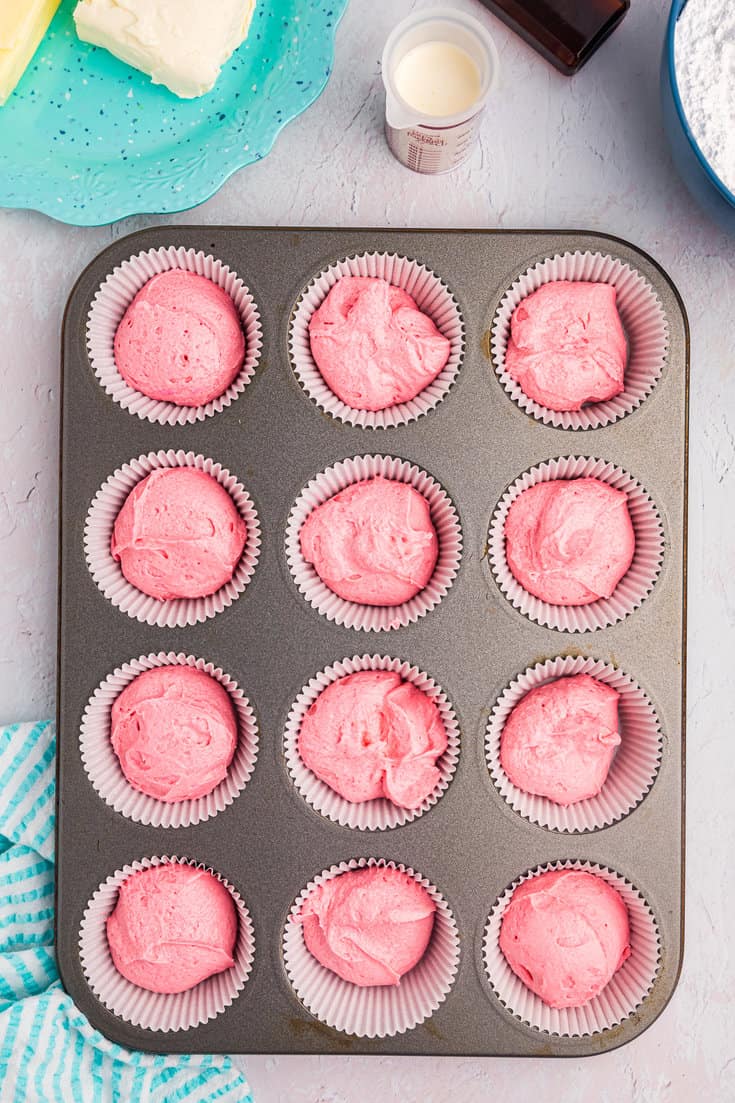 Unbaked pink velvet cupcakes.
