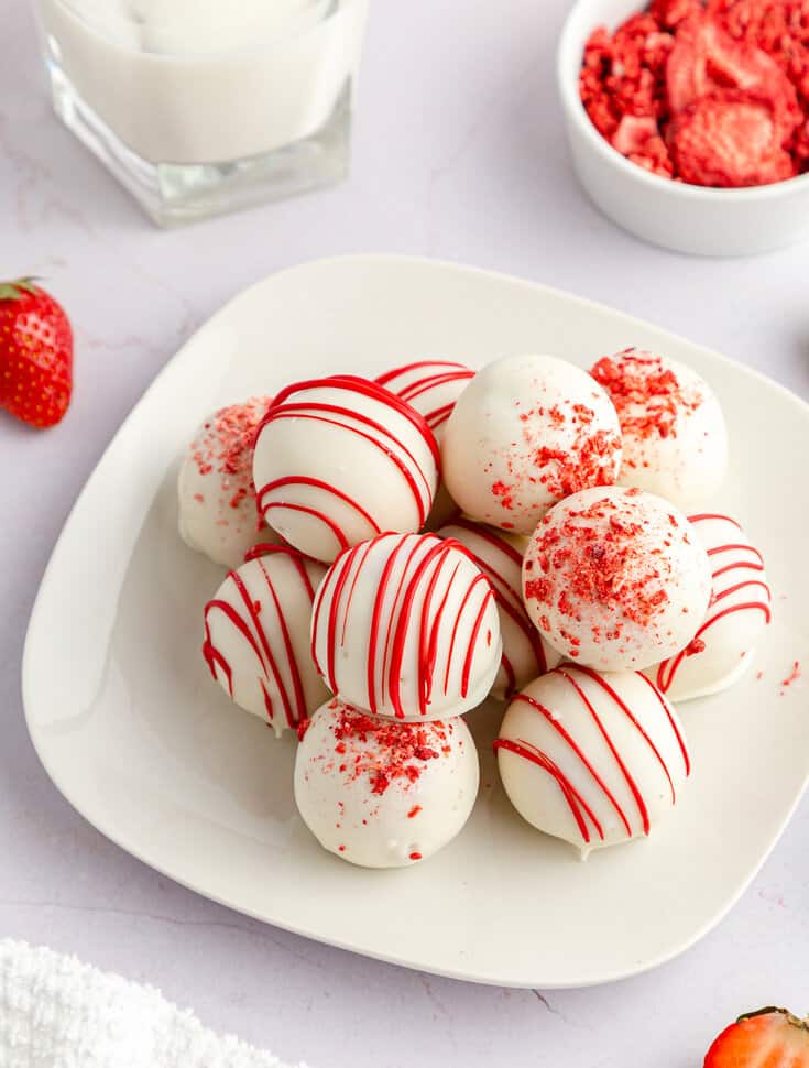 A plate of strawberry cake balls.
