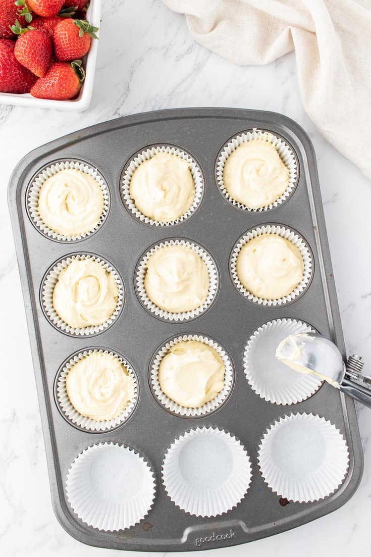 Fill the cupcake liners with batter.
