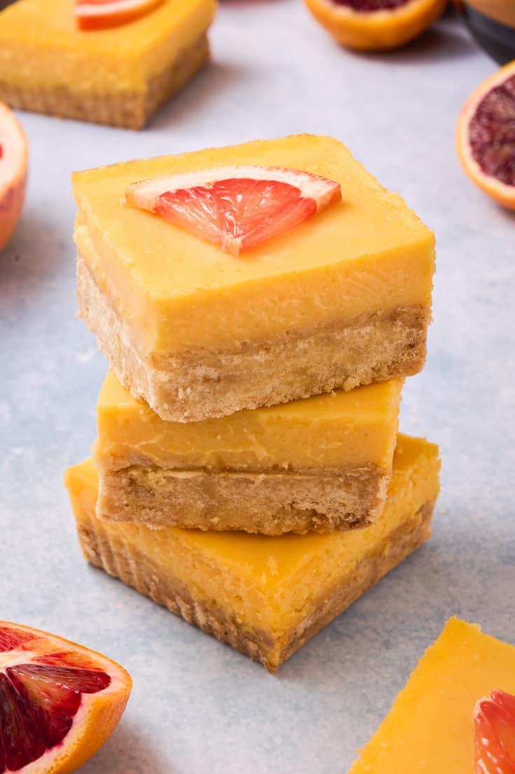 Grapefruit bars stacked on top of each other.
