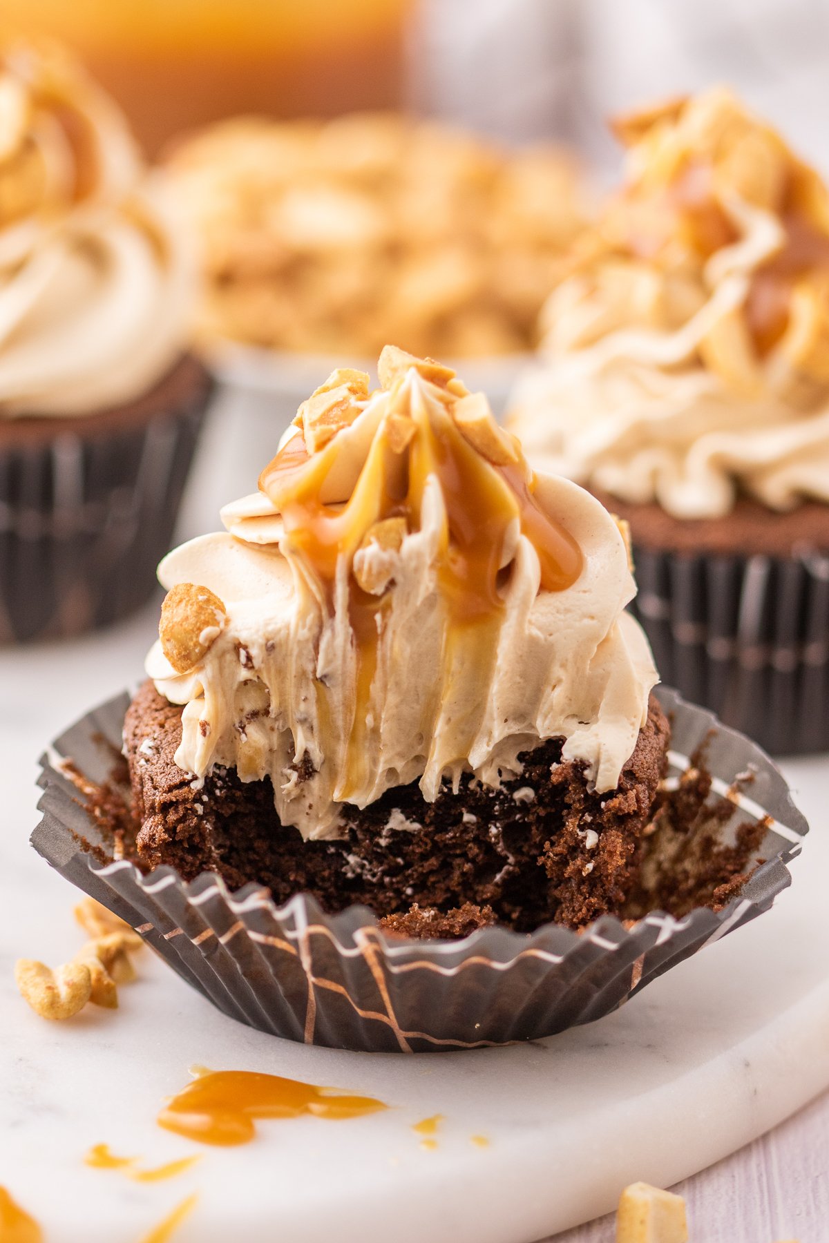 Snickers Cupcakes with a bite out of it. 