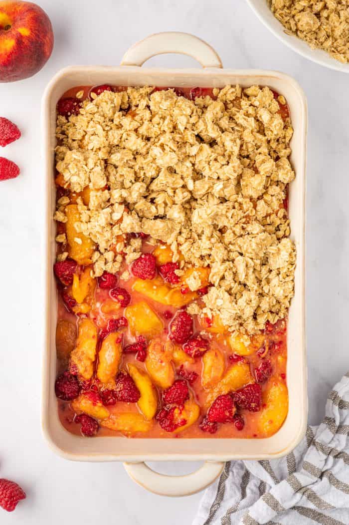 Peach raspberry crumble  with the topping on unbaked.